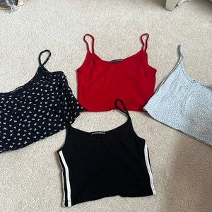 Four brandy Melville tank tops!